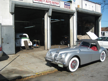 Antique Jaguar outside Barnett Auto Repair